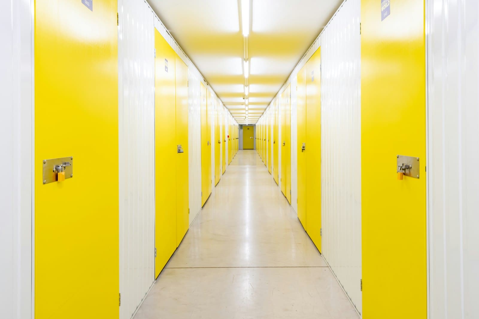 Self-storage corridor lined with unit doors
