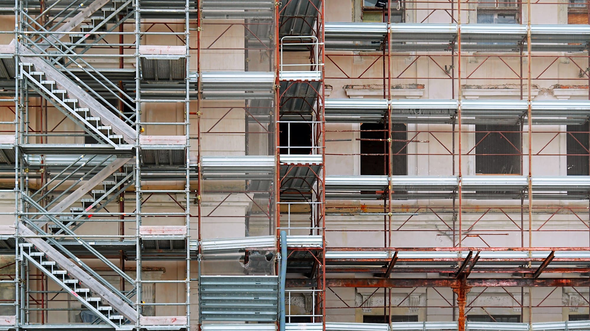 Building facade under renovation with scaffolding